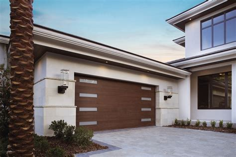 Modern garage door with horizontal rectangular windows on the top panel